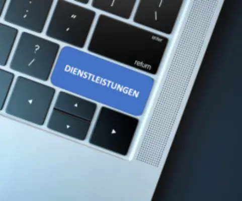 Tastatur mit Taste Dienstleistungen symbolisiert Dienstleistungen im Bereich der technischen Dokumentation